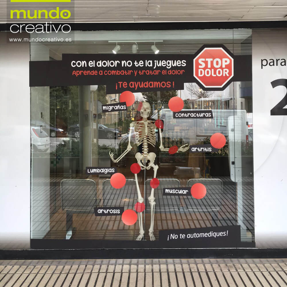 Escparate campaña Dolor en Farmacia El burgo, Madrid. Mundo Creativo